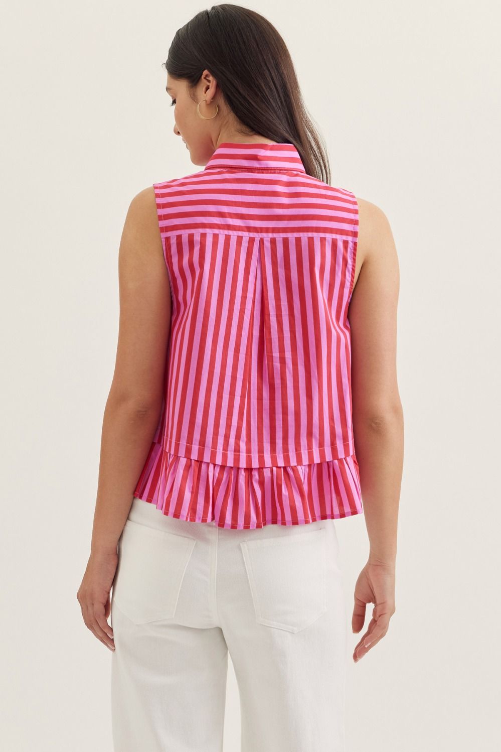 Striped sleeveless peplum top featuring tie neck detail